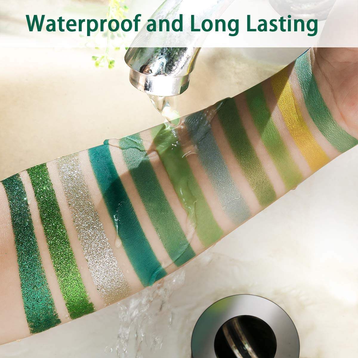 Green Eyeshadow swatches being rinsed under a faucet, showcasing durability and vibrant pigmentation.