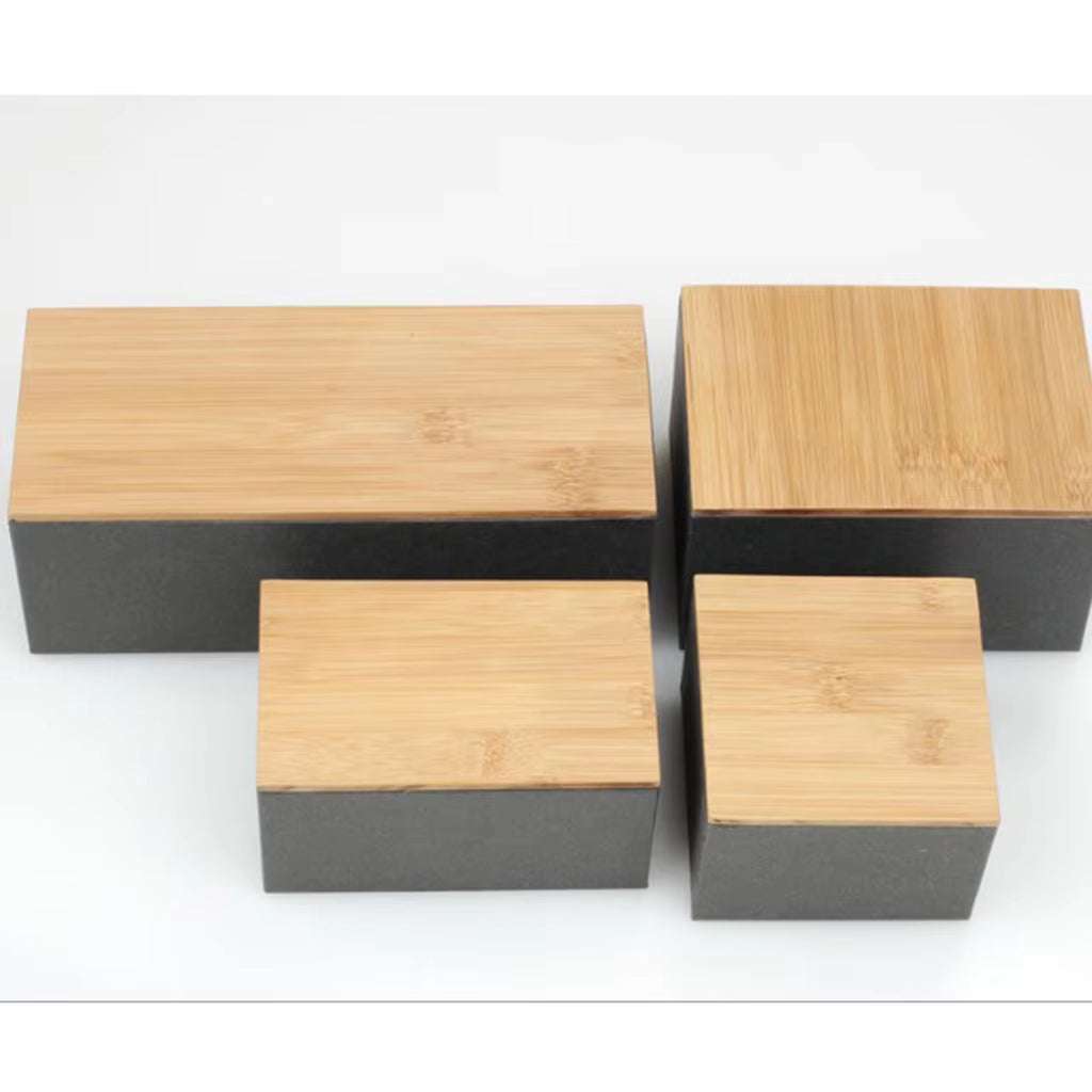 Set of four kitchen metal storage boxes with natural bamboo lids, airtight and eco-friendly design for organizing dry goods.
