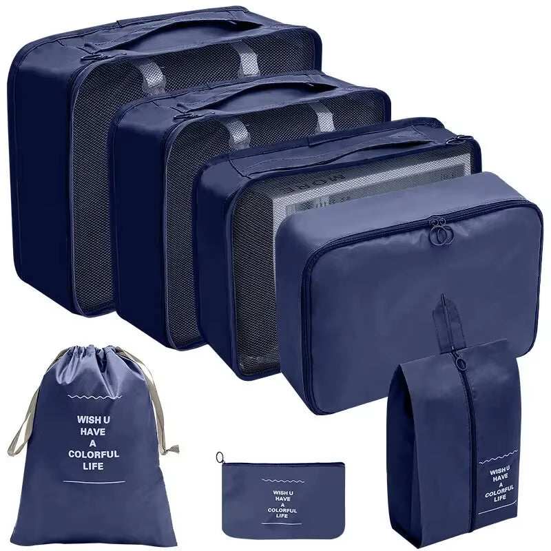 Travel Organizer Storage Bag Set with packing cubes and laundry bag in blue.