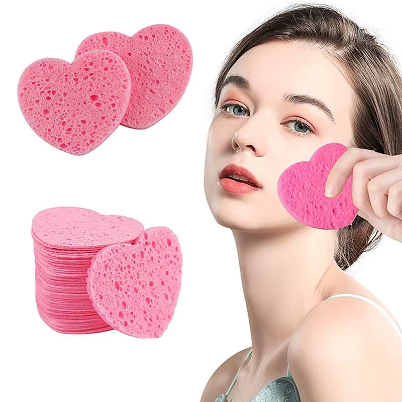 Heart-shaped pink makeup remover sponges for gentle cleansing and exfoliation.