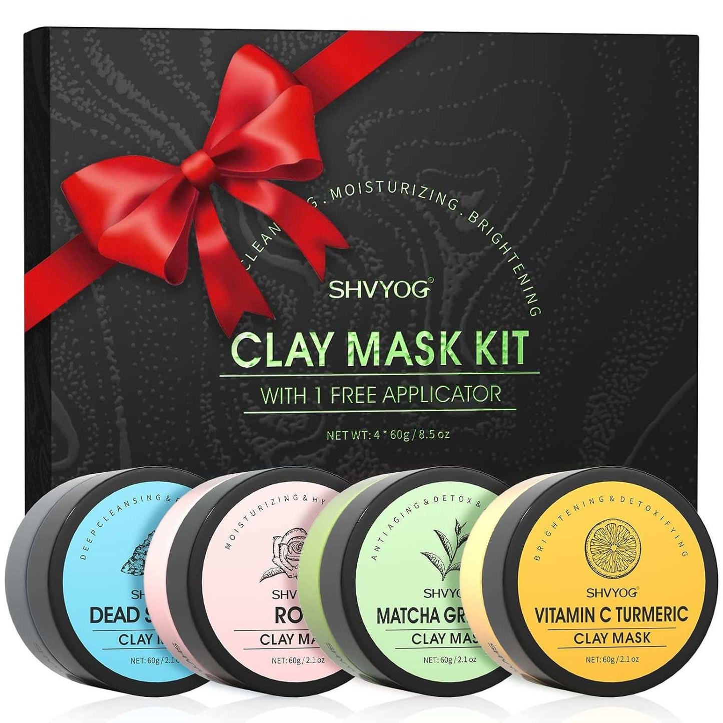 Four-piece clay facial mask set with jars of Dead Sea Mud, Rose, Green Tea, and Vitamin C & Turmeric masks.