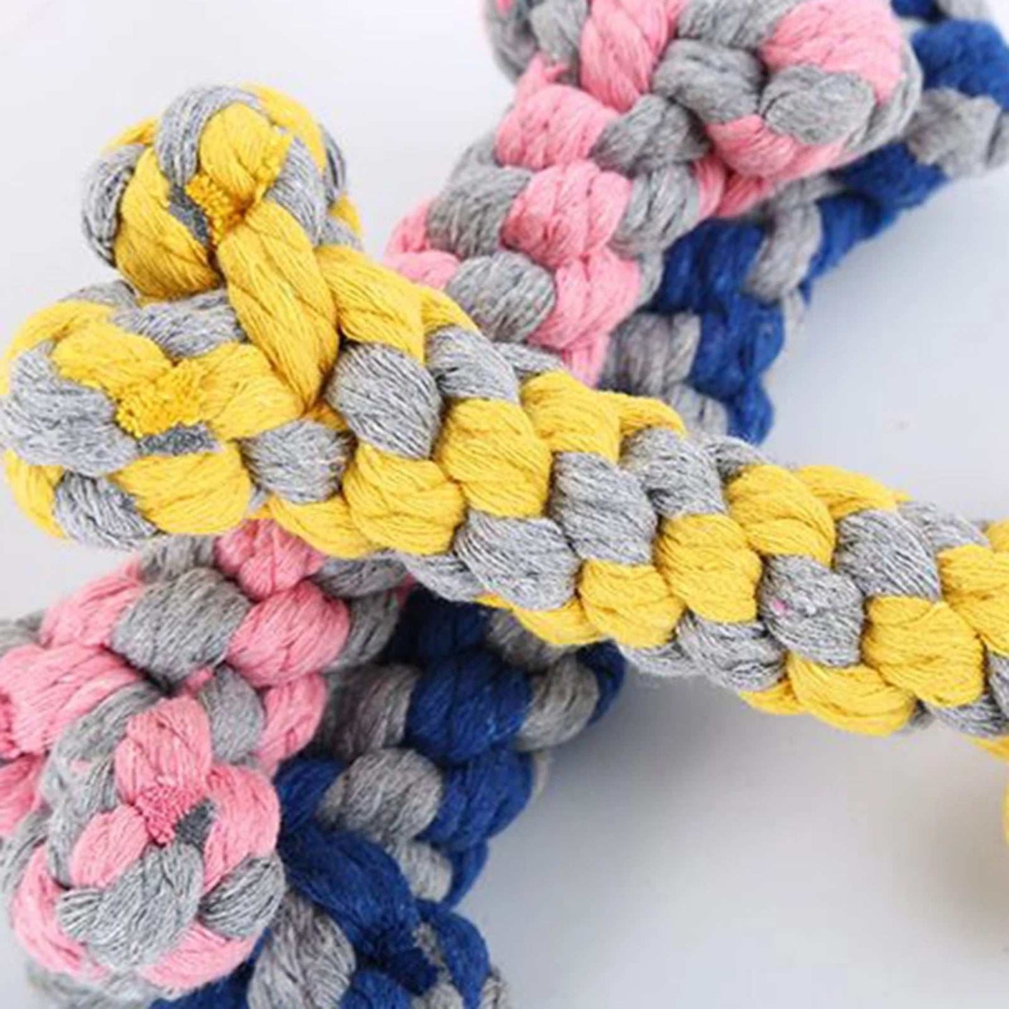 Durable multicolored cotton rope toy for dogs, ideal for strong chewers and dental health.