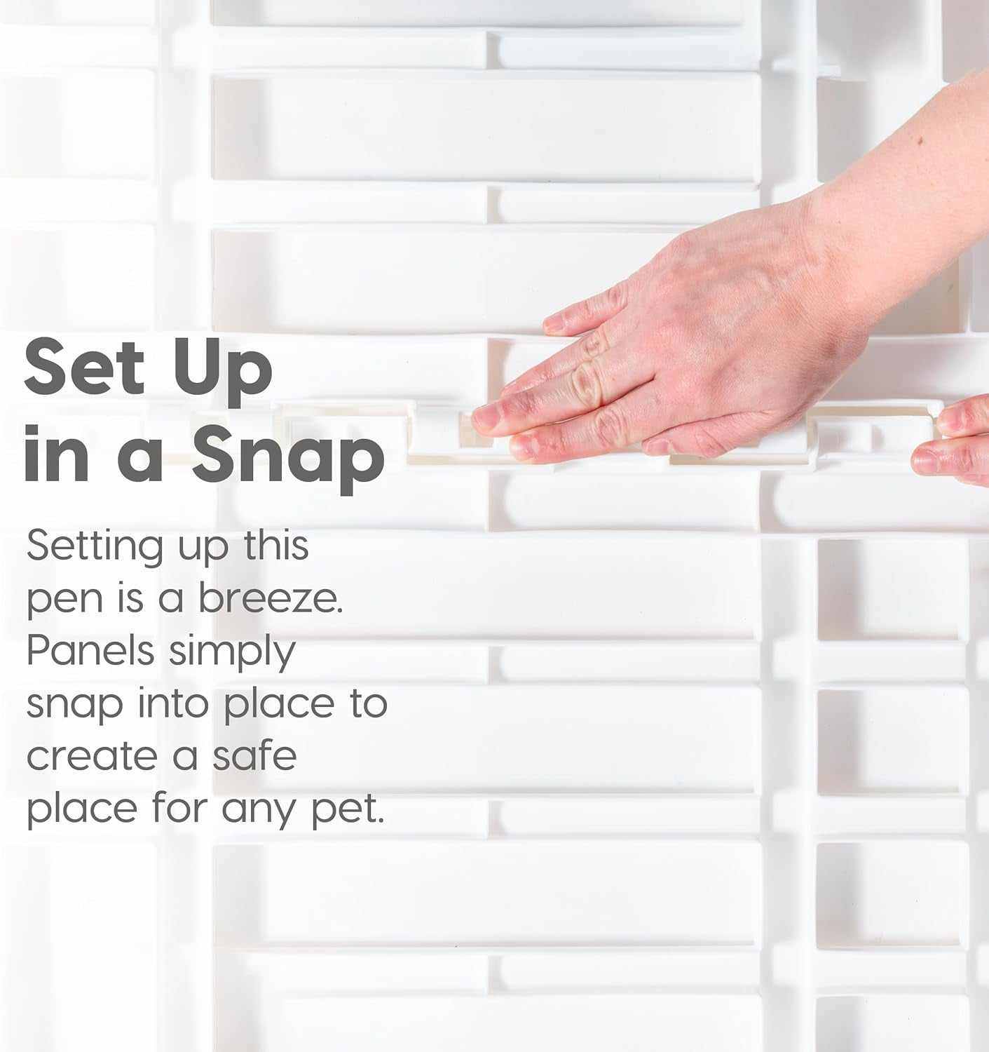 Hand assembling white pet exercise playpen door panel snapping into place for easy setup and secure pet enclosure