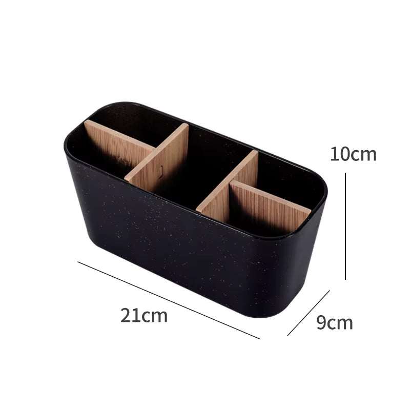 Black rectangular bamboo organizer with three compartments for toothbrushes and razors, measuring 21cm x 9cm x 10cm.