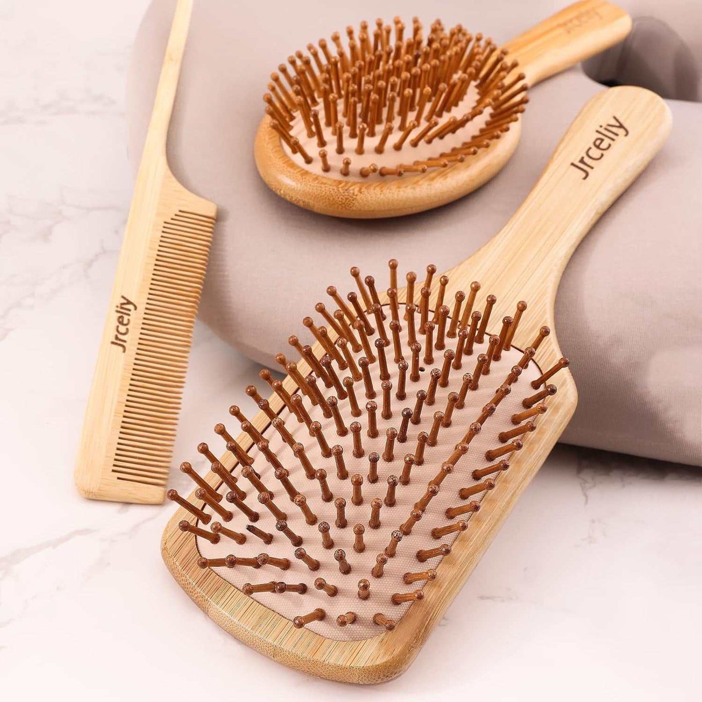 Eco-friendly women wooden paddle Bamboo Hair Brush set with bamboo bristles for anti-static hair care.