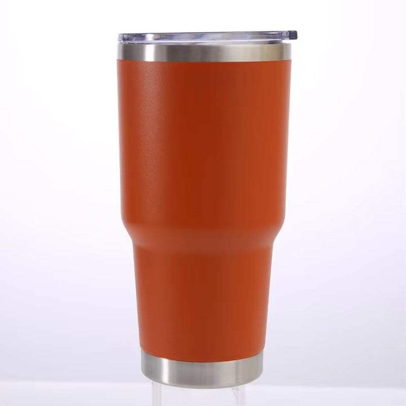 Stainless steel tumbler with double-wall vacuum insulation for travel.