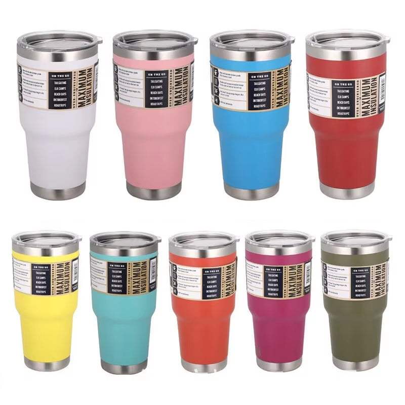 Colorful stainless steel tumblers with lids designed for hot or cold travel beverages.