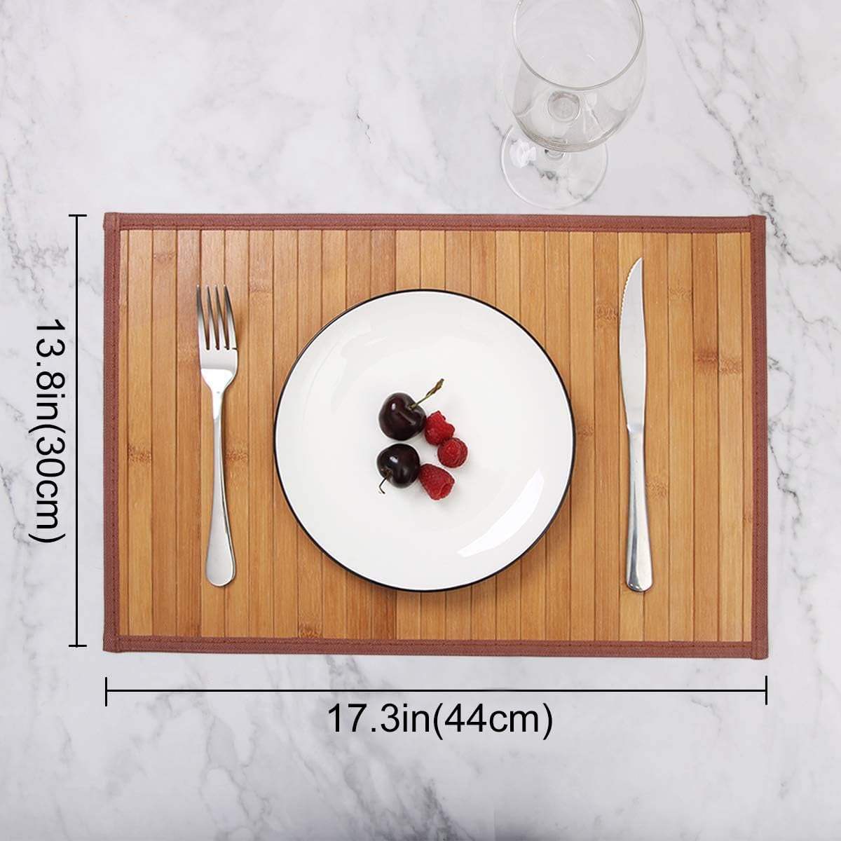Bamboo Table Mat with natural finish, featuring heat and stain resistance, shown with plated dish and cutlery.