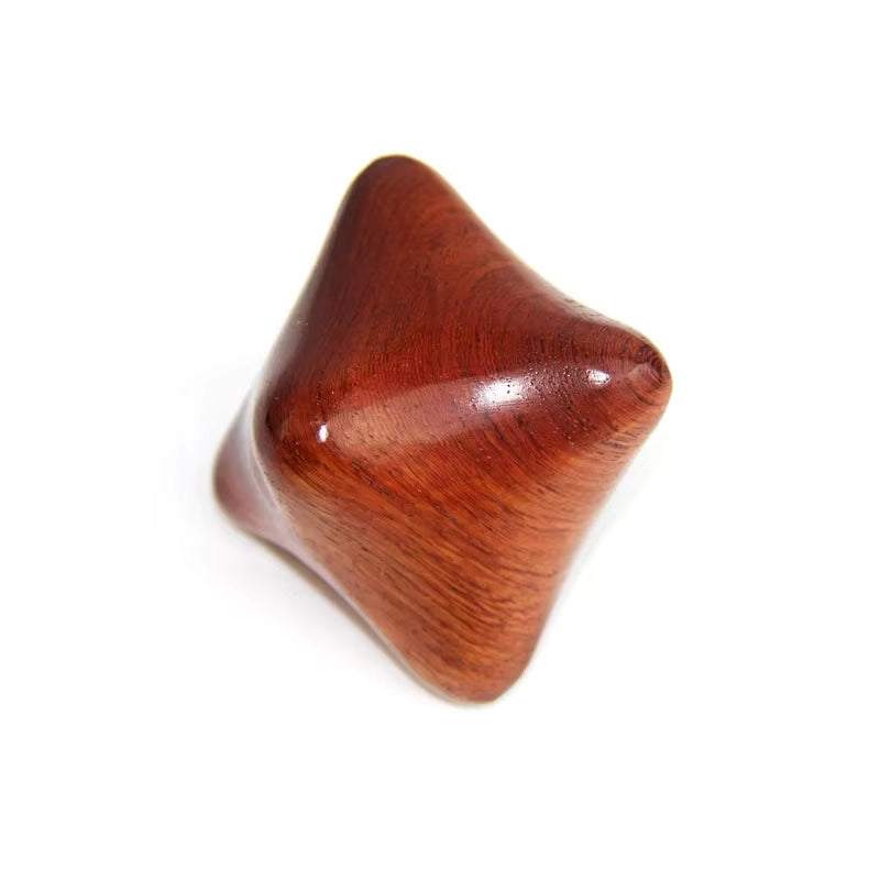 Wooden massage stick with natural finish for deep tissue therapy.