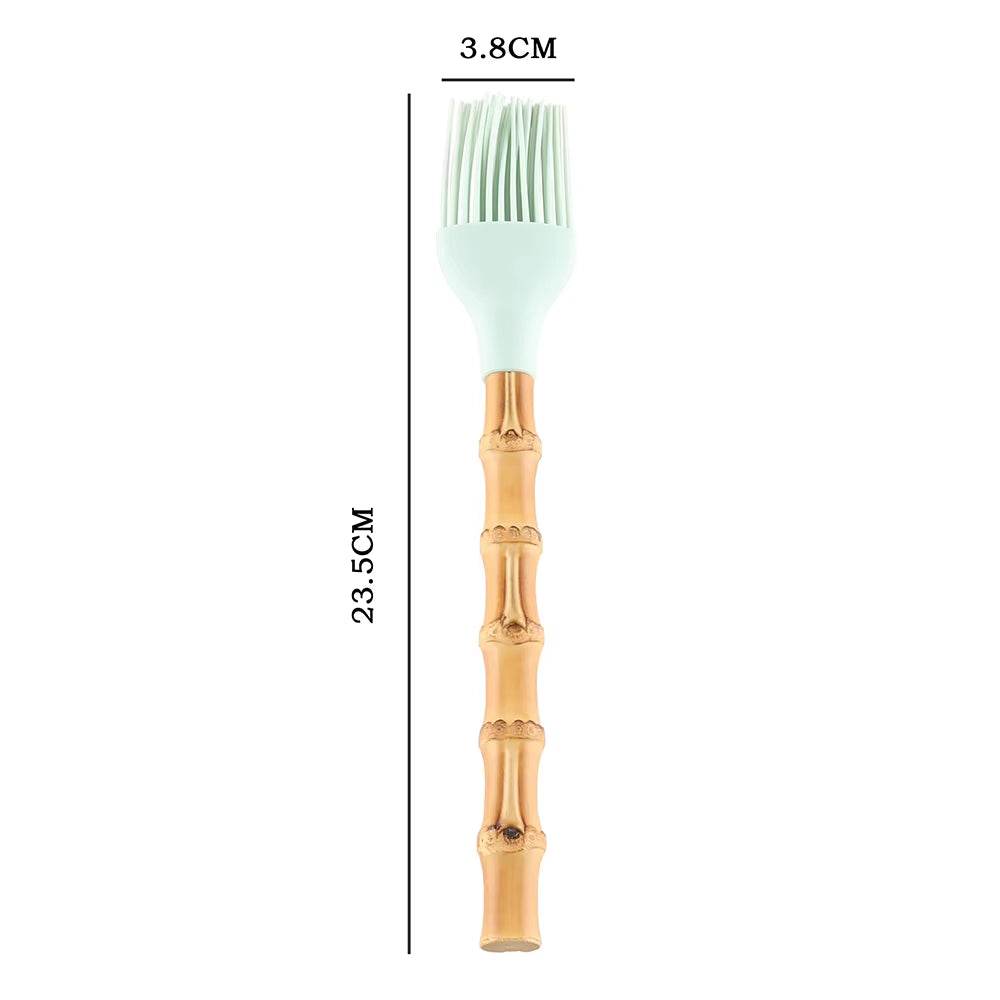 Bamboo kitchenware kitchen utensil with a silicone head and ergonomic handle, eco-friendly and heat-resistant.
