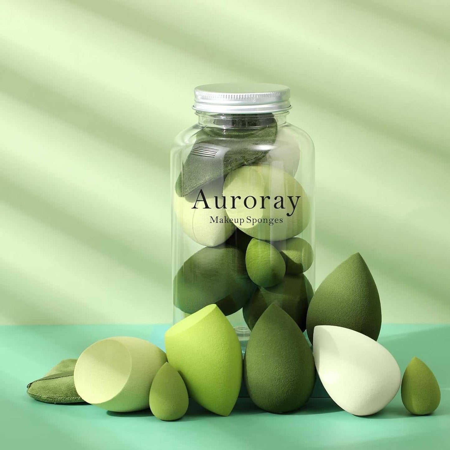 Set of green and white makeup sponges and puffs for flawless foundation, concealer, and powder application
