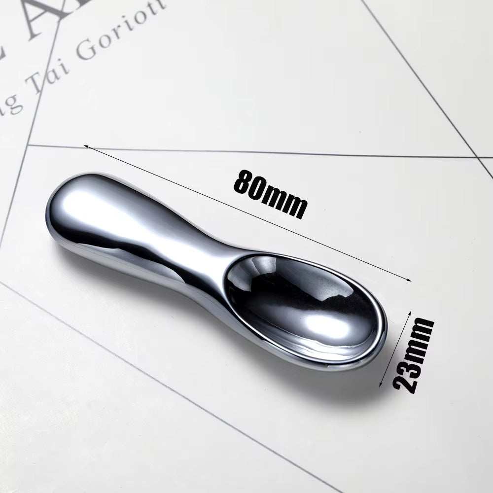 Skincare scraper facial massager with ergonomic design, made from premium terahertz stone for enhanced skincare routine.