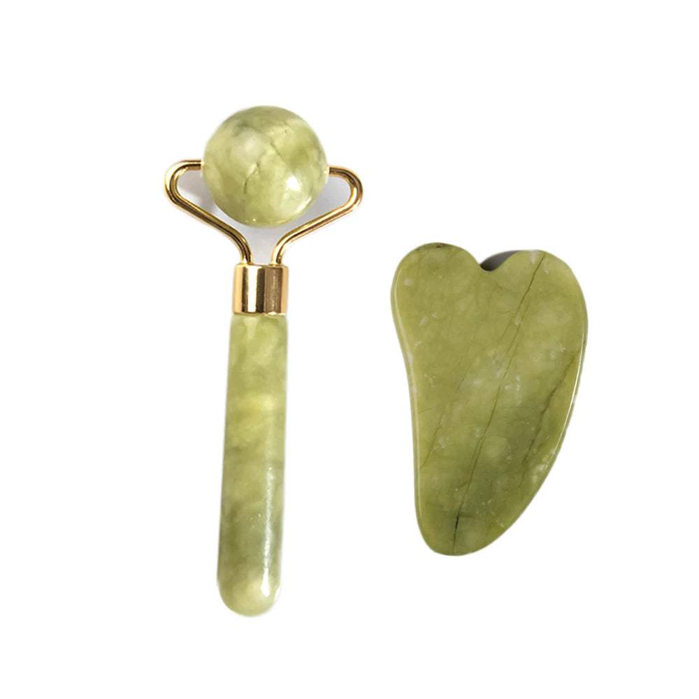 Natural jade face roller and Gua Sha scraper set for skincare massage in natural green jade.