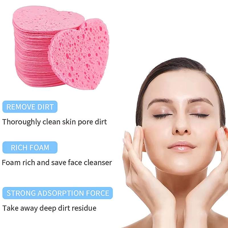Heart-shaped pink makeup remover sponges, perfect for facial cleansing and exfoliation.