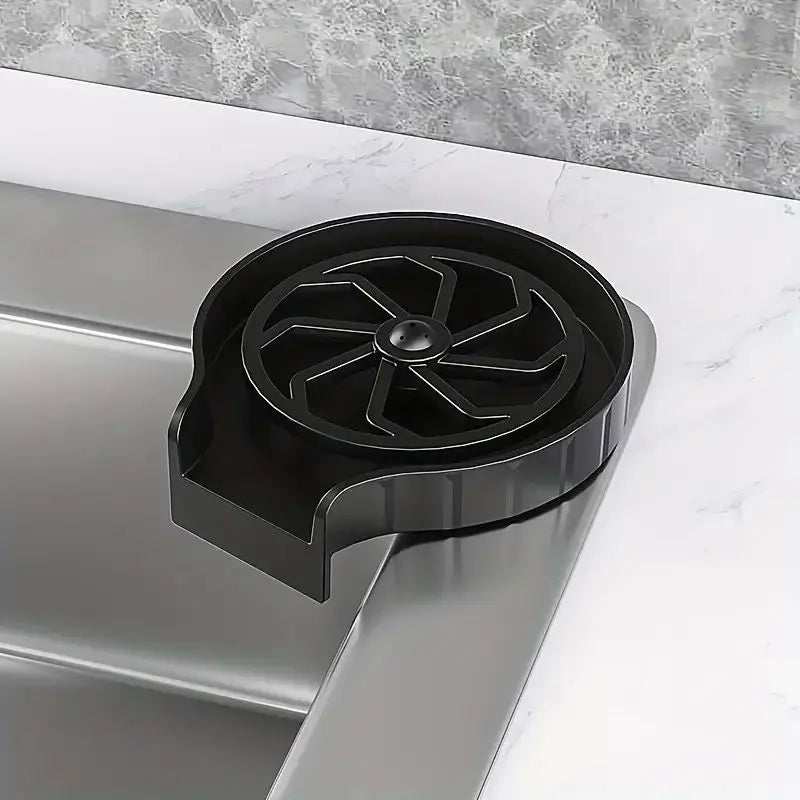 High pressure automatic cup washer mounted on kitchen sink.