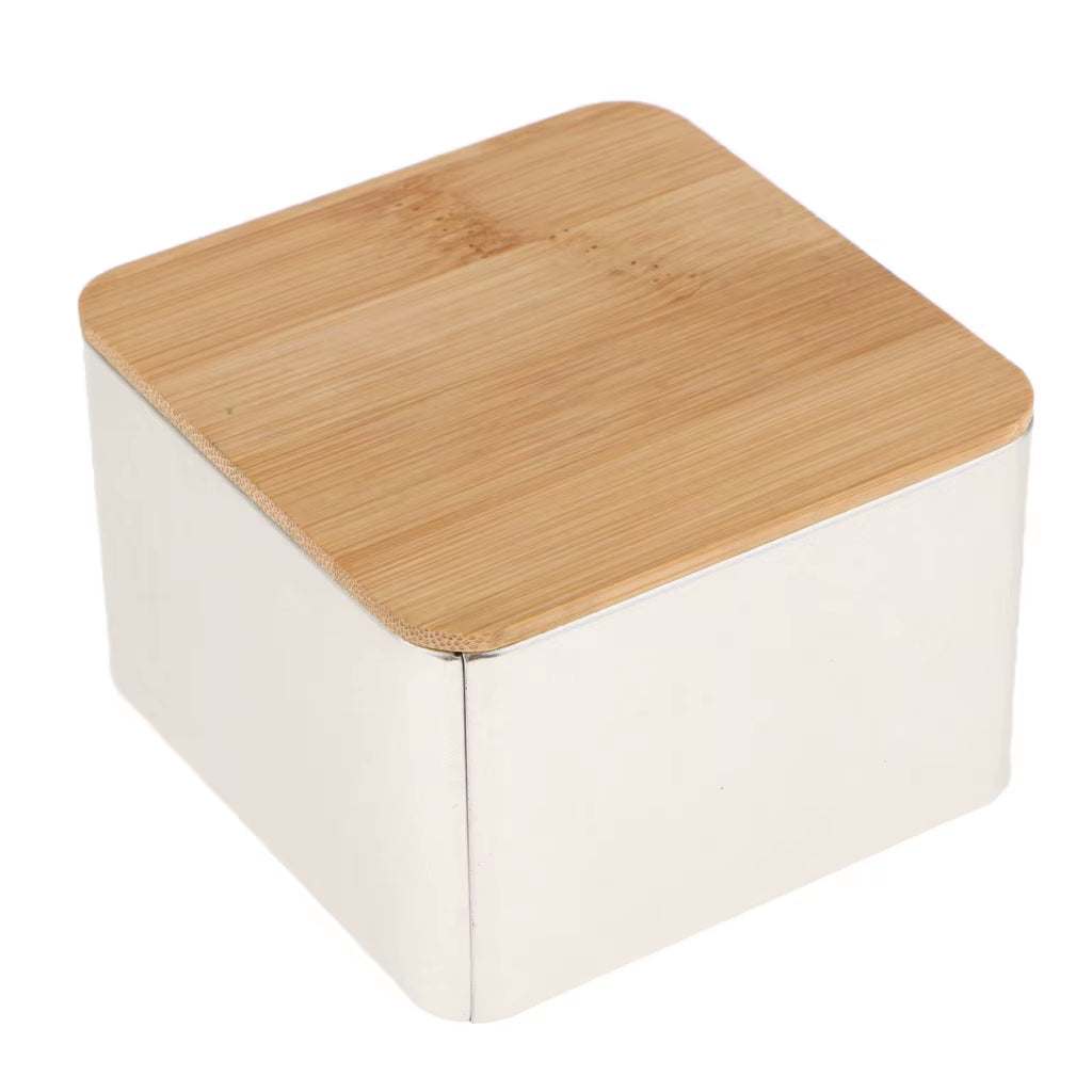 Kitchen metal storage box with airtight bamboo lid for organizing dry goods and preserving freshness.
