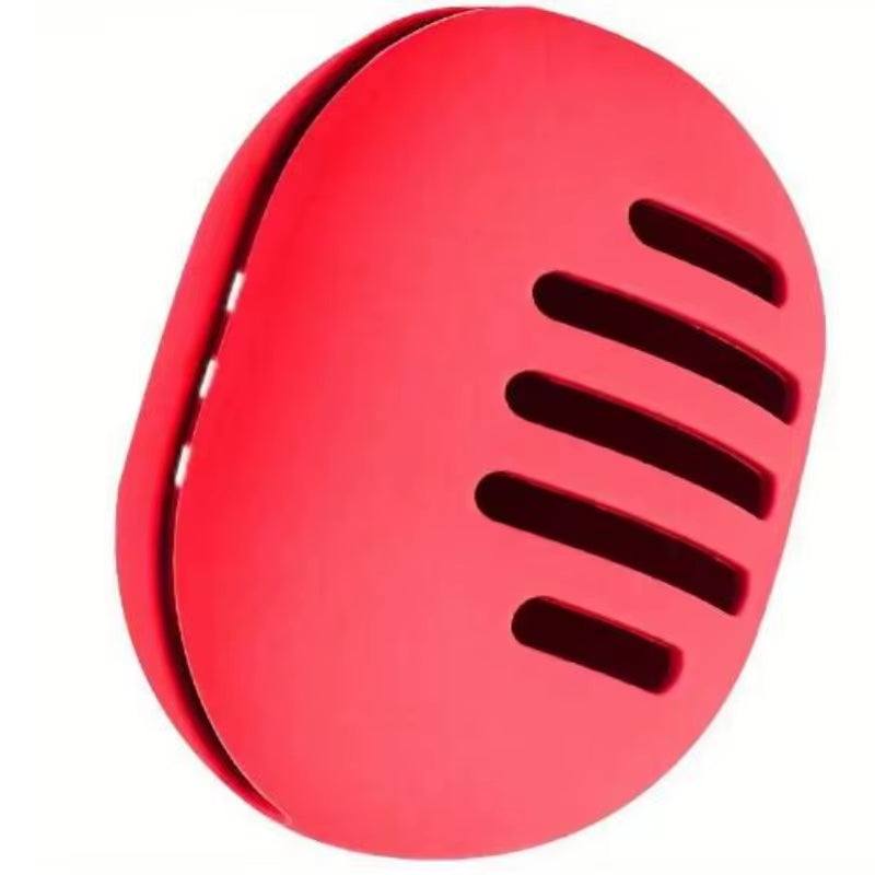 Eco-friendly red silicone makeup sponge holder with ventilated design for travel.