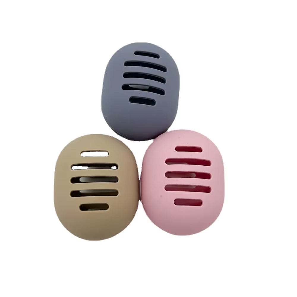 Eco-friendly silicone makeup sponge holders in multiple colors with ventilated design.