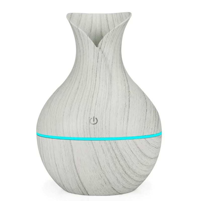 Portable USB mini air humidifier with silent operation and compact wood grain design for home and office use