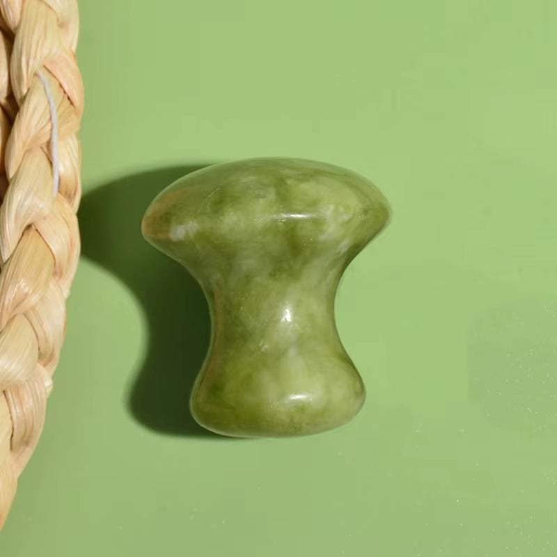 Natural Green Massager quartz jade massager roller for face, neck, and eye care, mushroom-shaped for relaxation.