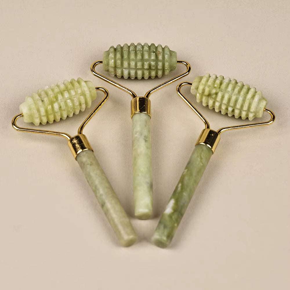 Natural jade face roller massager set for skin care, puffiness reduction, and firming.