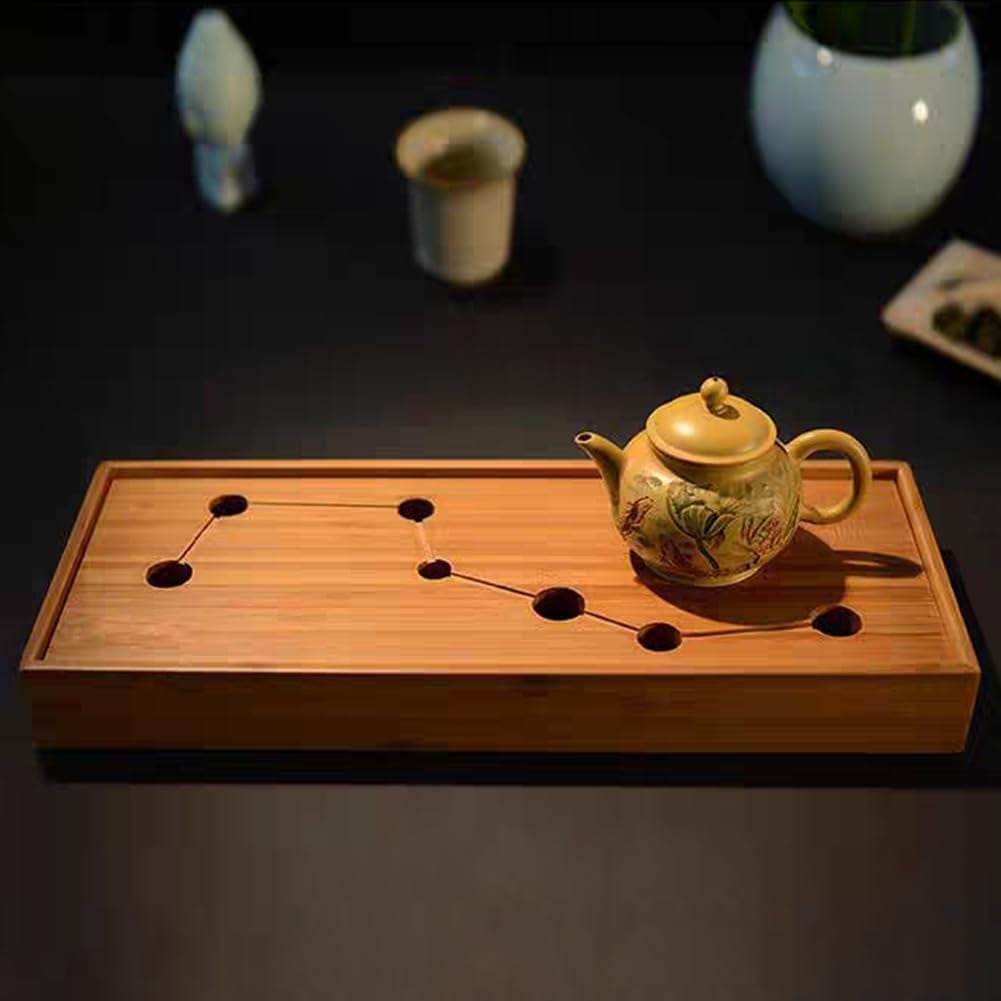 Bamboo tea tray with teapot, ideal for Gongfu tea ceremonies.
