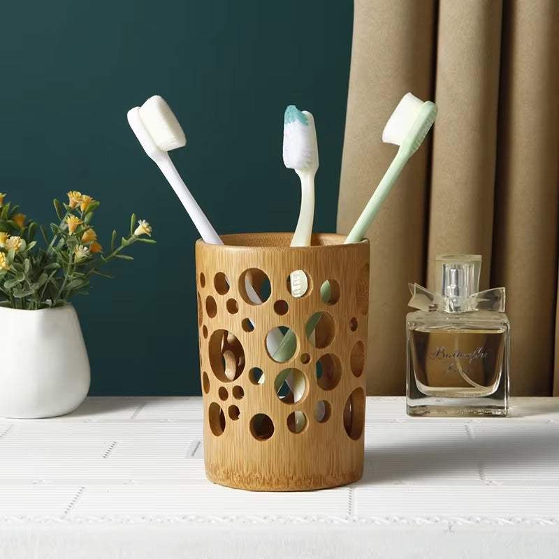 Natural bamboo toothbrush organizer with circular cutouts for bathroom countertop organization