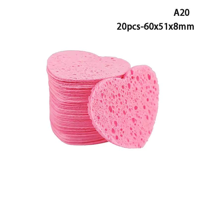 Heart-shaped pink cellulose makeup remover sponge set, eco-friendly and biodegradable, for gentle facial cleansing and exfoliation.