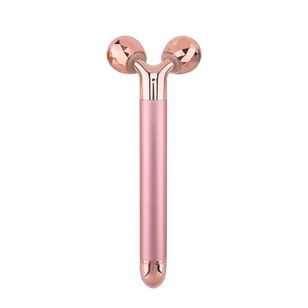 3D roller massager with dual rotating rollers for facial lifting and massage, pink finish.