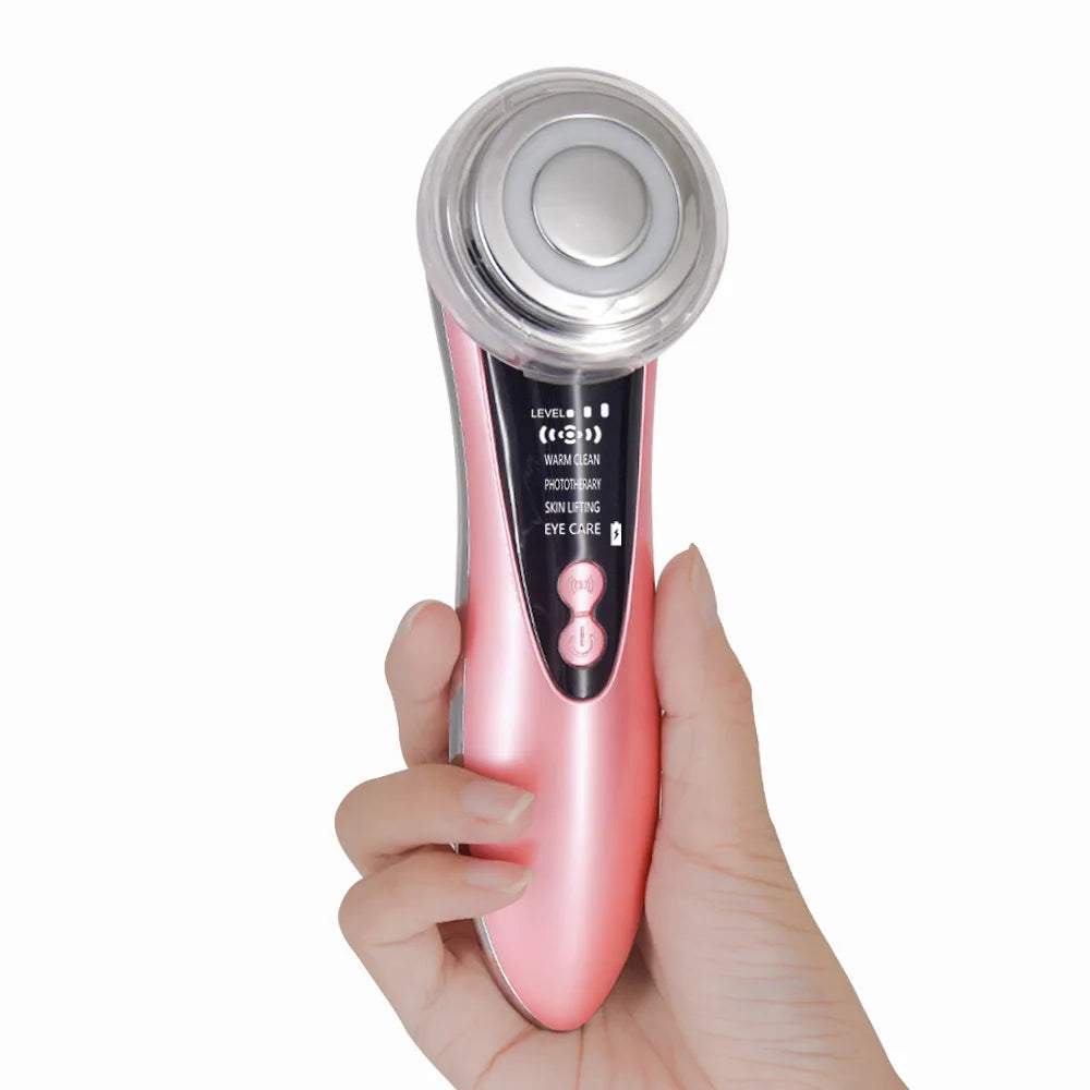Pink beauty electric microcurrent face massager with ergonomic design, featuring LED display and multifunctional head.