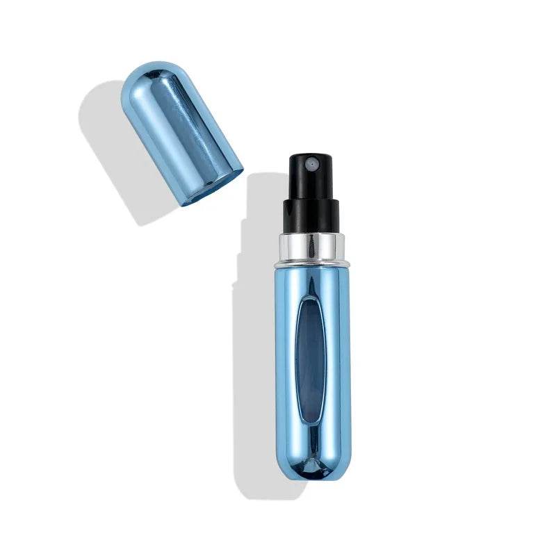 Portable refillable 5ml perfume spray bottle with leak-proof design and sleek blue finish for travel and daily use
