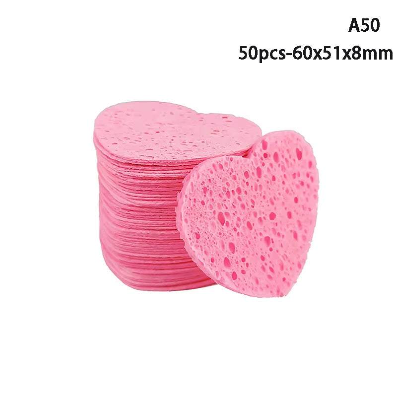Heart-shaped pink cellulose makeup remover sponges; eco-friendly, compressed design, set of 50.
