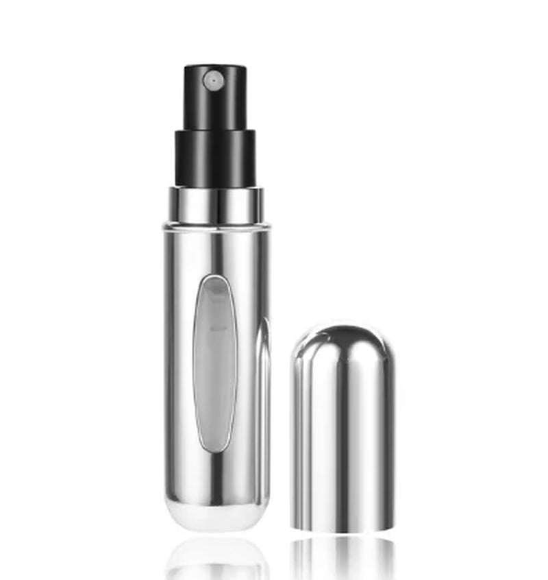 Portable 5ml refillable perfume spray bottle with sleek silver design and leak-proof cap for travel use