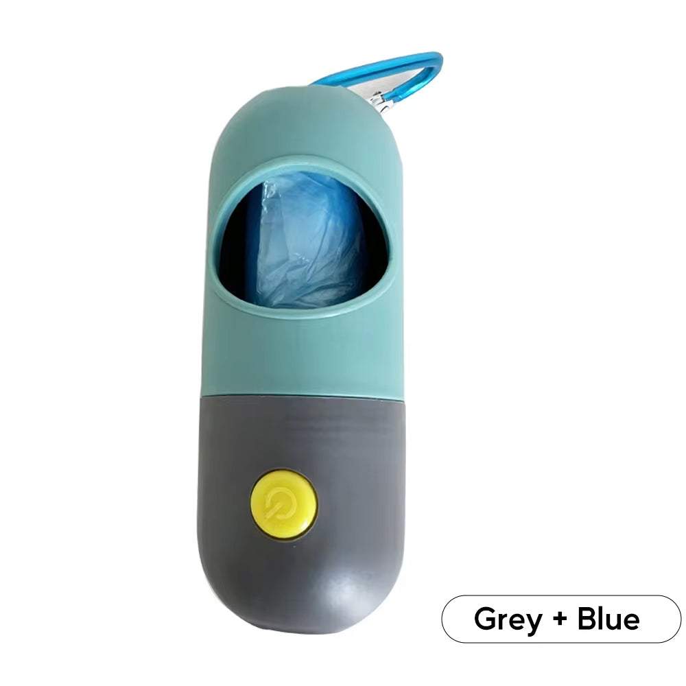 Portable dog waste bag dispenser with built-in LED light for night walks, eco-friendly degradable bags, compact grey and blue design with yellow button.