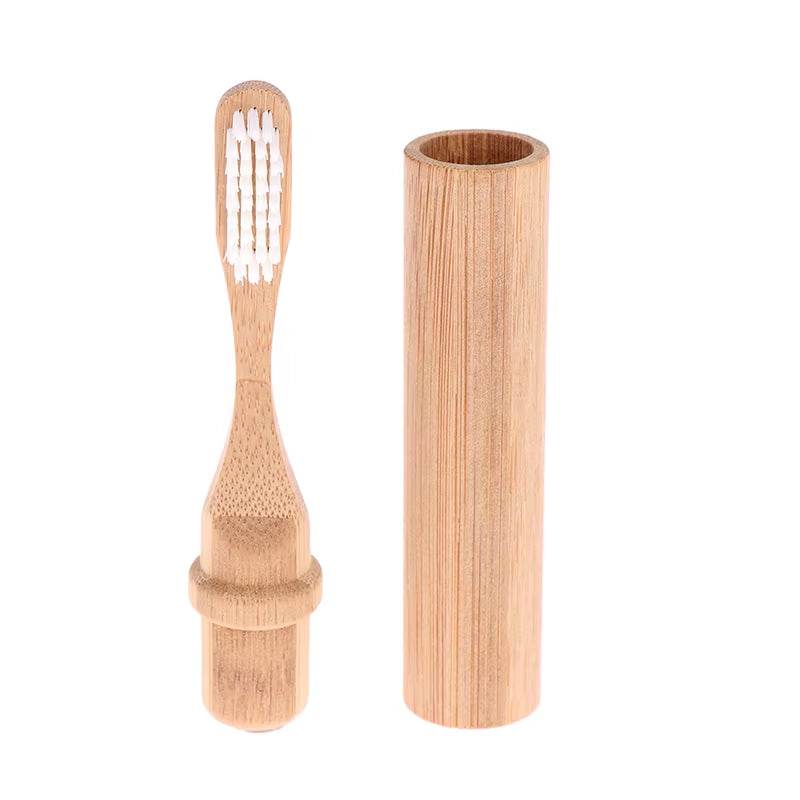 Wood handle portable bamboo toothbrush with charcoal-infused soft bristles and matching bamboo case for travel and eco-friendly oral care