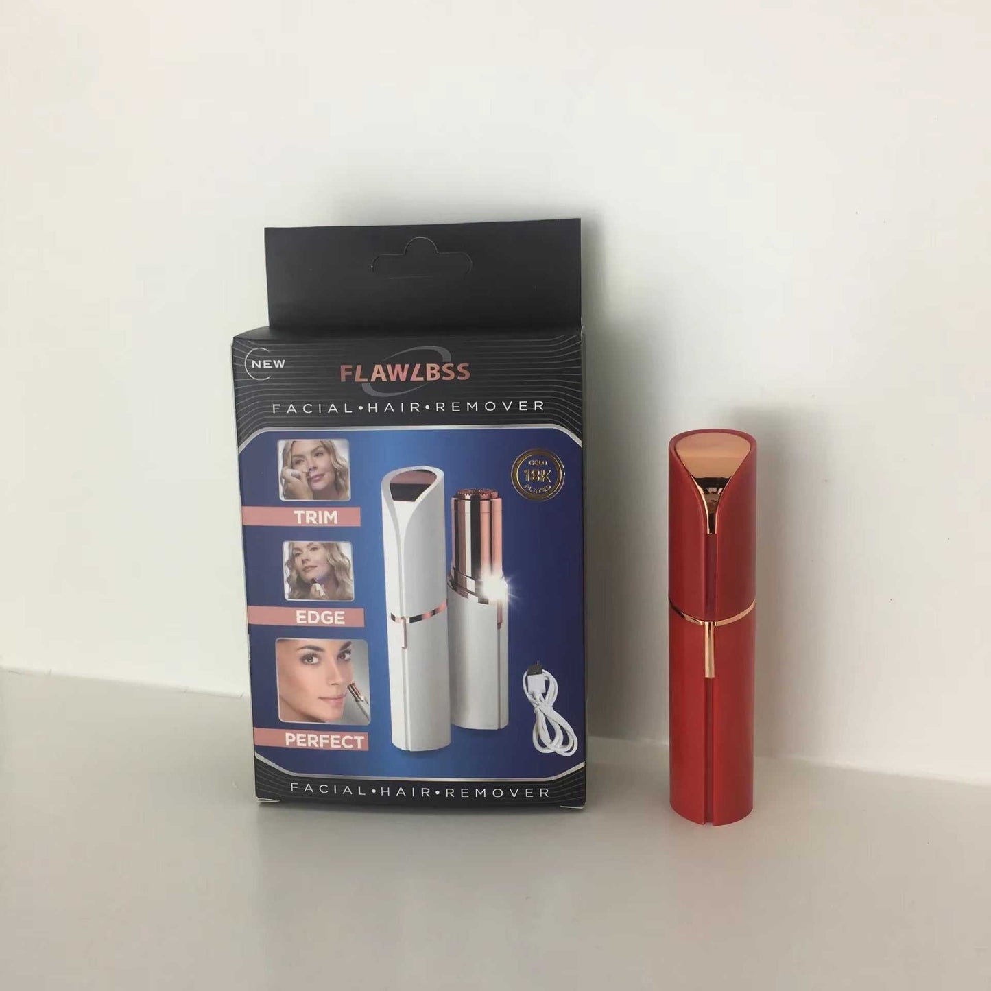 Portable electric hair removal trimmer with lipstick-style design, featuring a compact and rechargeable mini shaver for painless facial hair removal.