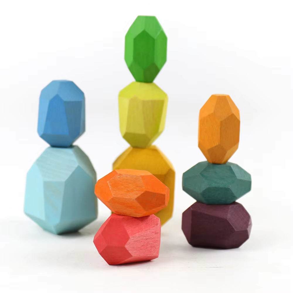Colorful wooden sensory stacking stones for toddlers.