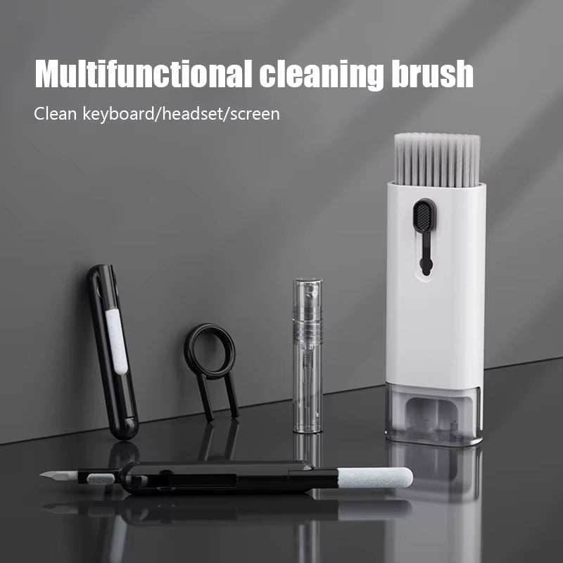 Multifunctional electronic cleaning kit with brush and tools for keyboards, headsets, and screens.