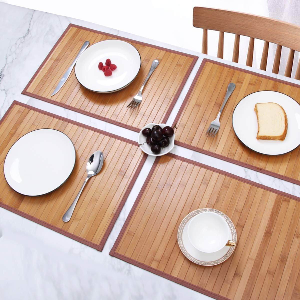 Bamboo Table Mat on a marble table, featuring plates, forks, and a cup.