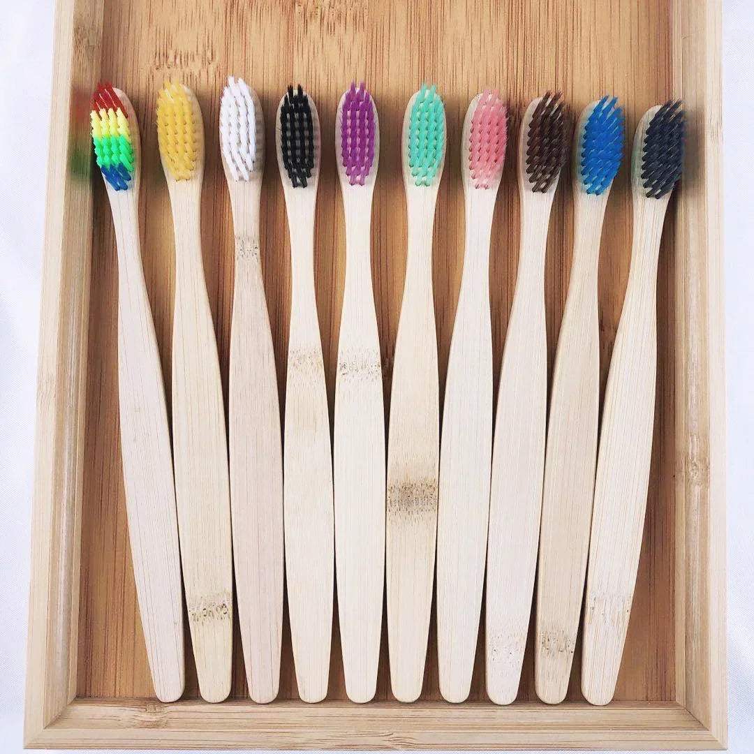 Set of 10 colorful natural bamboo toothbrushes with soft charcoal-infused bristles for eco-friendly oral care