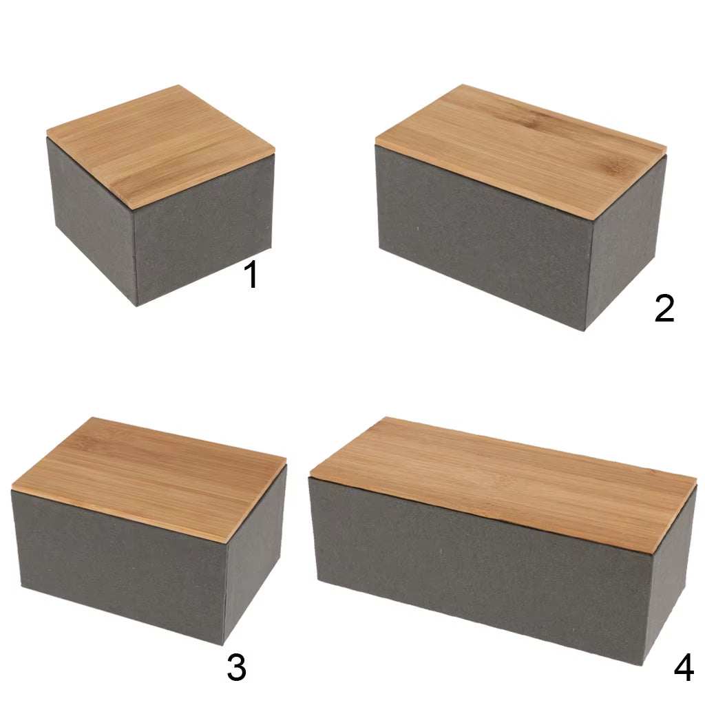Set of four kitchen metal storage boxes with bamboo lids in various sizes for dry goods organization