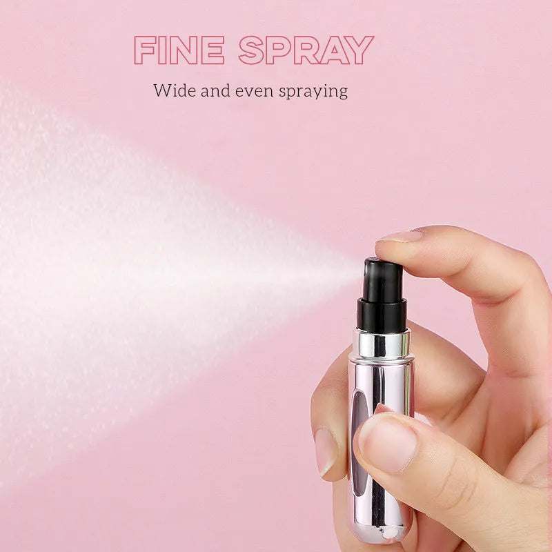 Portable 5ml refillable perfume atomizer bottle with fine spray, compact and leak-proof design for travel use.