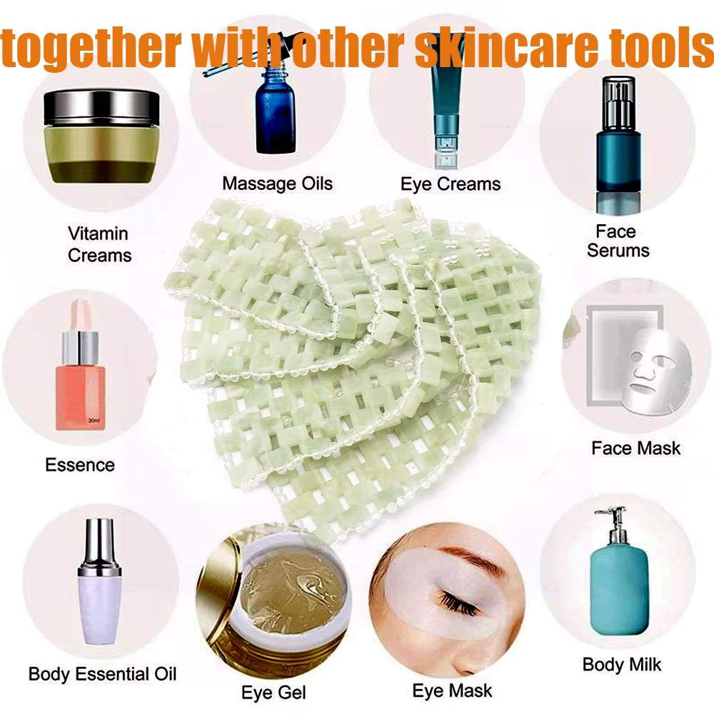 Natural jade face massager set enhancing skincare routine with massage oils and creams.