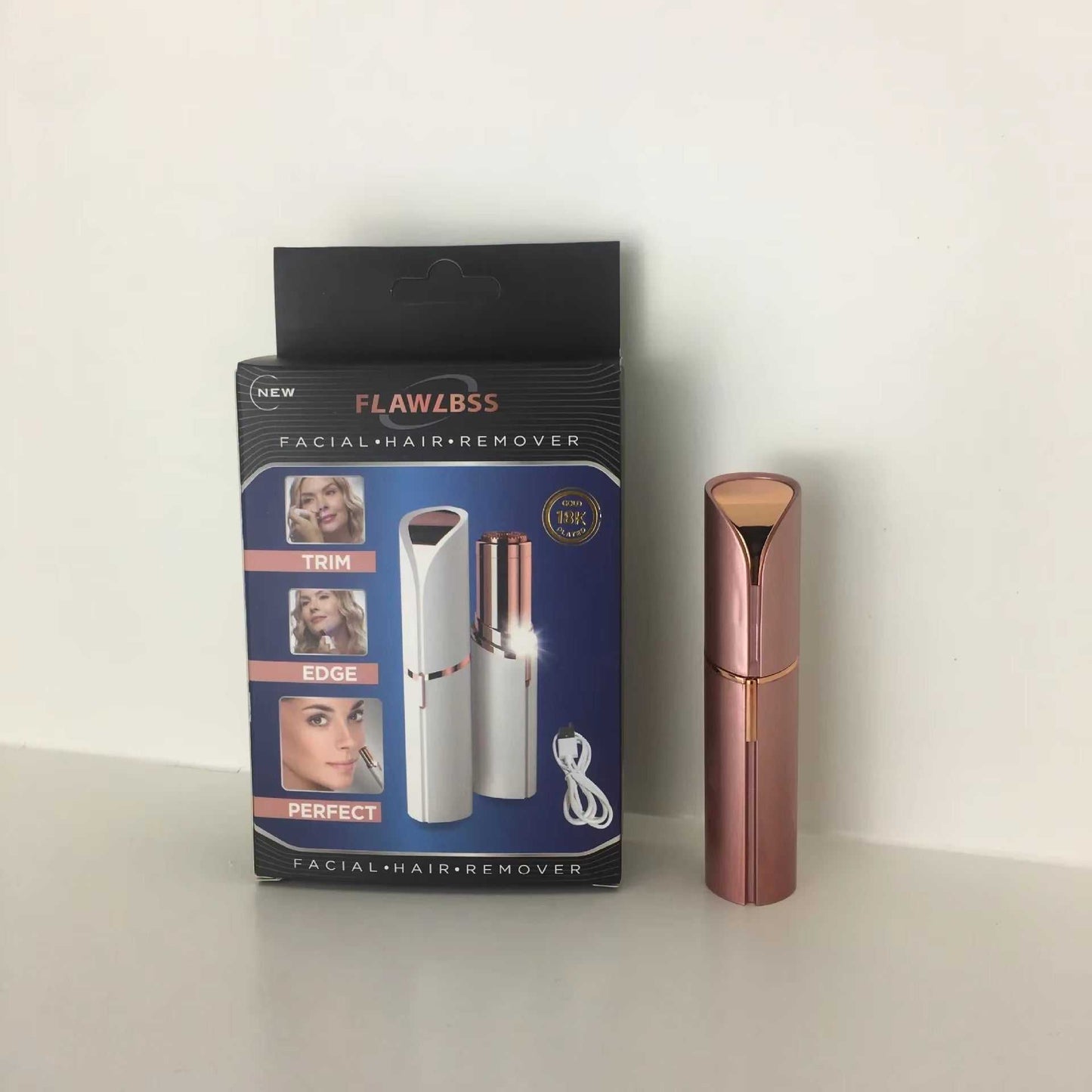 Portable electric hair removal trimmer with sleek lipstick-style design for painless facial hair removal, rechargeable and travel-friendly.