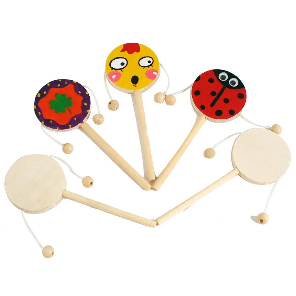 DIY rattle-drum wooden shaking toy set with colorful painted designs and unfinished options for crafting fun.