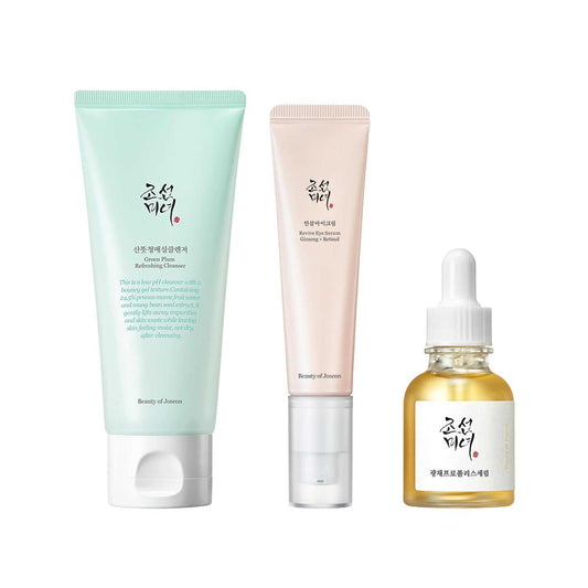 Wrinkle Trio Green Plum skincare set with cleanser, revive eye serum, and glow serum for deep cleansing, hydration, anti-aging, and brightening.